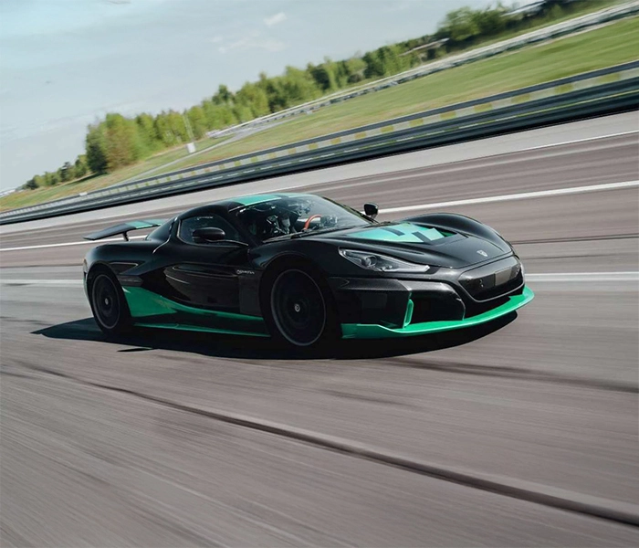 Rimac Nevera electric supercar driving on a track