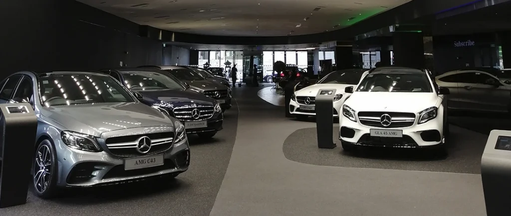 Mercedes showroom with two rows of used cars